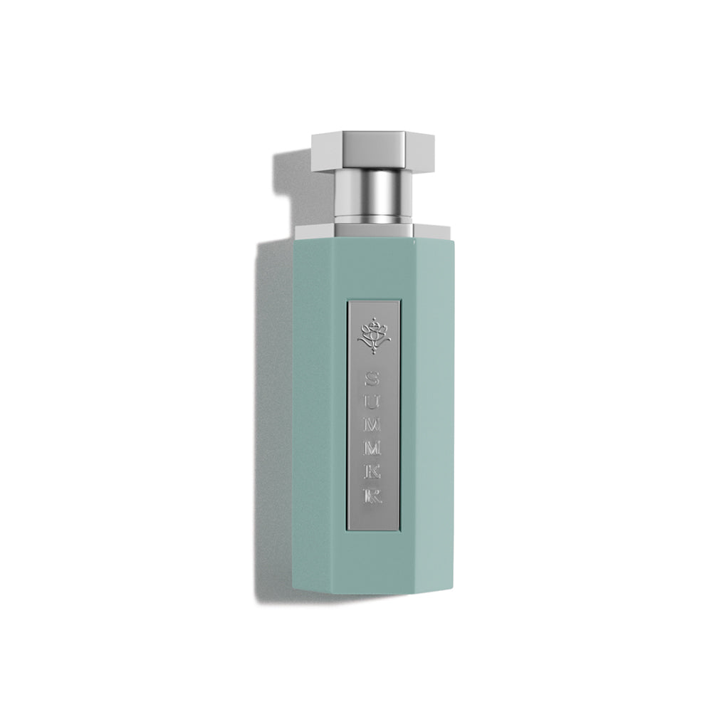 REEF – TIFFANY unisex parfumflacon op witte achtergrond met mandarijn, perzik en musk – een frisse en zonnige geur